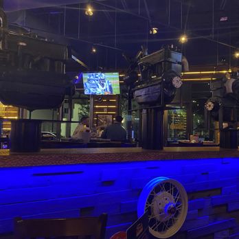 Ford's Garage Plantation - Display of old motors. - Bars Near Me - Plantation, Florida