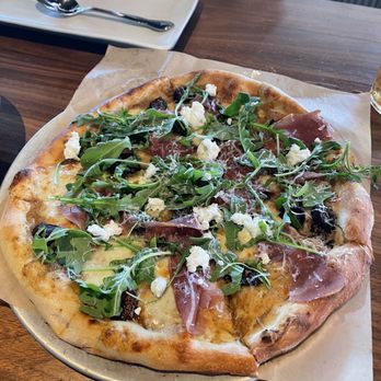 North Italia - PROSCIUTTO pizza with mission fig, goat cheese, arugula - Italian Near Me - Franklin, Tennessee North Italia - PROSCIUTTO pizza with mission fig, goat cheese, arugula - Italian Near Me - Franklin, Tennessee
