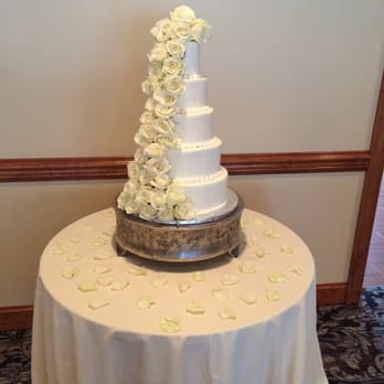 Half Baked Patisserie - a wedding cake on a table - Bakeries Near Me - Middletown, Delaware Half Baked Patisserie - a wedding cake on a table - Bakeries Near Me - Middletown, Delaware