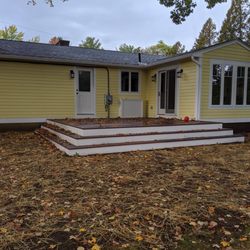 Chagnon Building & Remodeling - Custom cascading Mahogany deck with new LP SmartSide siding and Paradigm windows