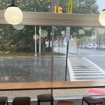 Sweet Trail Cafe - a view of a street through a window - Coffee & Tea Near Me - Bloomfield, New Jersey