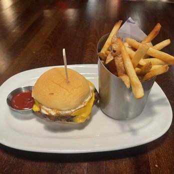 Stout NYC - Double smash cheeseburger with an egg on top and fries - Irish Near Me - New York, New York Stout NYC - Double smash cheeseburger with an egg on top and fries - Irish Near Me - New York, New York