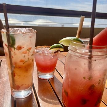 The Beachcomber - Our drinks: Endless Summer, a margarita (forgot which flavor) , and the Big Jar Watermelon drink - Seafood Near Me - Newport Beach, California The Beachcomber - Our drinks: Endless Summer, a margarita (forgot which flavor) , and the Big Jar Watermelon drink - Seafood Near Me - Newport Beach, California