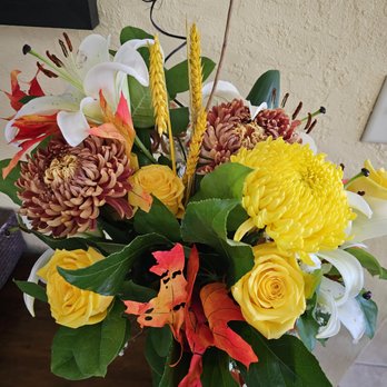 Jewel-Osco - a vase of flowers on a table - Grocery Near Me - Moline, Illinois