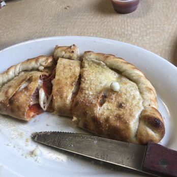 The Whistle Stop Pizzeria & More - a plate of pizza - Pizza Near Me - Baxter, Tennessee
