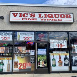 Vic's Liquor Store - Exterior view. Building is adjacent to "Mattress firm" and "Choice Pet". Quick parking lot. No headaches.
