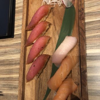 Top Sushi - various types of sushi on a cutting board - Sushi Bars Near Me - Richmond, Texas Top Sushi - various types of sushi on a cutting board - Sushi Bars Near Me - Richmond, Texas