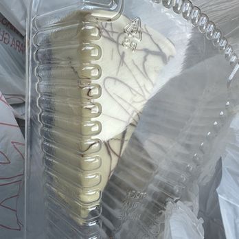 Maitland Chocolate Factory - a piece of cake in a plastic container - Chocolatiers & Shops Near Me - Maitland, Florida