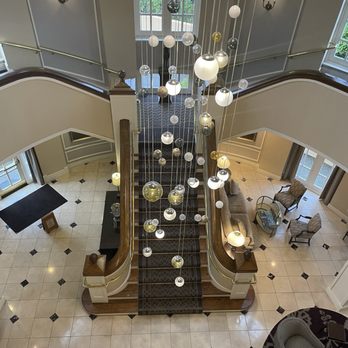 Lafayette Park - The chandelier hanging in the lobby, beautiful staircase, if you don't want to use the elevators - Hotels Near Me - Lafayette, California Lafayette Park - The chandelier hanging in the lobby, beautiful staircase, if you don't want to use the elevators - Hotels Near Me - Lafayette, California