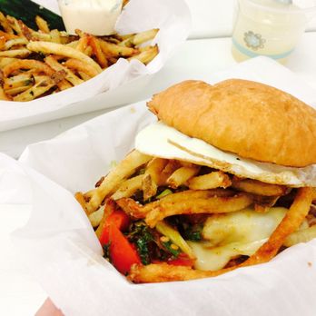 Frita Batidos - Chorizo loco with some cilantro garlic fries - Cuban Near Me - Ann Arbor, Michigan