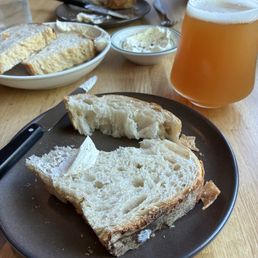 Crusty sourdough bread and home churned butter made with crème fraiche. Crusty sourdough bread and home churned butter made with crème fraiche.