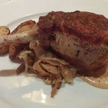 Orsay - Eden farms berkshire Pork chop, roasted potatoes, pommery mustard cream, braised cabbage - French Near Me - Jacksonville, Florida
