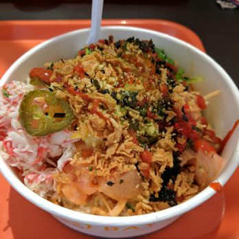 Bay Poke - Regular with brown rice, spicy salmon, yellow tail and regular salmon. Topped with deep fried onion, crab, jalapeno, furikake (seaweed), egg - Hawaiian Near Me - Irvine, California