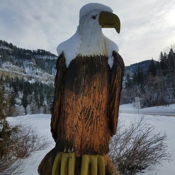 Latchstring Restaurant - Eagle with a snowy mantel. Wishing us a great day on the snowmobile trails - New American Near Me - Lead, South Dakota Latchstring Restaurant - Eagle with a snowy mantel. Wishing us a great day on the snowmobile trails - New American Near Me - Lead, South Dakota