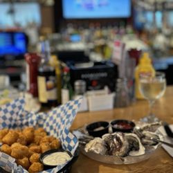 Shucker's Oyster Bar - Oysters and tots
