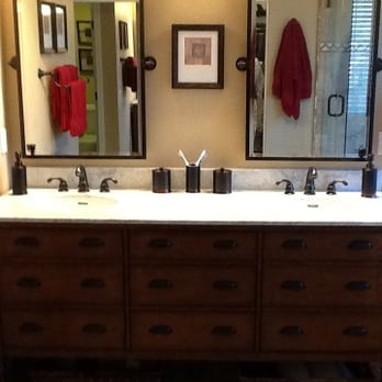 American Builders - a bathroom with double sinks and mirrors - General Contractors Near Me - Pacifica, California American Builders - a bathroom with double sinks and mirrors - General Contractors Near Me - Pacifica, California
