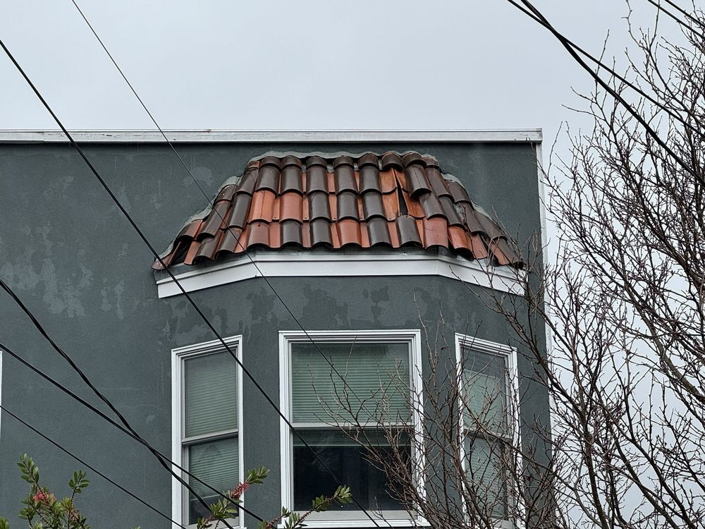 Slide of Hernandez's Roofing