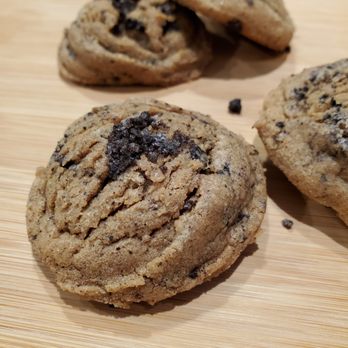 Three Chip Confections - chocolate chip cookies on a cutting board - Desserts Near Me - Land O' Lakes, Florida