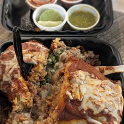 El Paisano Taqueria - Wet super burrito and front counter menu.