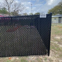 Rightway Fence - Semi private slats in black chain link fence. LOVE it'n
