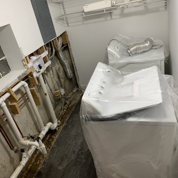 Global Home Improvement - Laundry room post demo - General Contractors Near Me