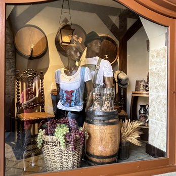 Biergarten Restaurant - a window display of a couple - German Near Me - Lake Buena Vista, Florida Biergarten Restaurant - a window display of a couple - German Near Me - Lake Buena Vista, Florida