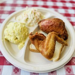 Gus's World Famous Fried Chicken - Wing and Thigh Plate with sides of Potato Salad and Slaw