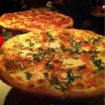 Home Slice Pizza - Pepperoni in the back, Margarita in the front - Pizza Near Me - Austin, Texas Home Slice Pizza - Pepperoni in the back, Margarita in the front - Pizza Near Me - Austin, Texas