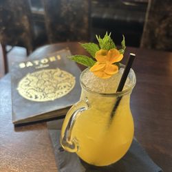 Siam Thai Restaurant - The Mango Unchained. Basically just a vodka mango juice with a flower, no hint of the spice promised