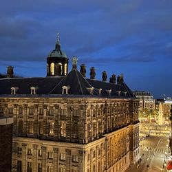 MR PORTER - View past the Royal Palace to the square beyond.