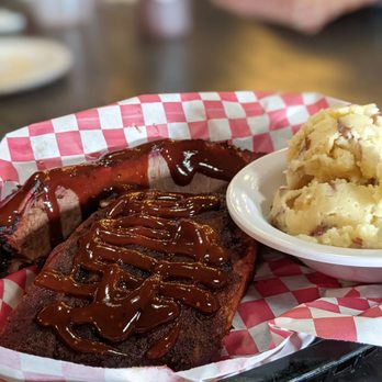 Slo' Bones BBQ Smokehaus - plate of ribs and mashed potatoes - Barbeque Near Me - Frankenmuth, Michigan Slo' Bones BBQ Smokehaus - plate of ribs and mashed potatoes - Barbeque Near Me - Frankenmuth, Michigan