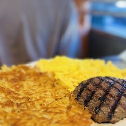 Mama's Table - Hamburger patty and scrambled eggs w/ hash browns, served w/ toast