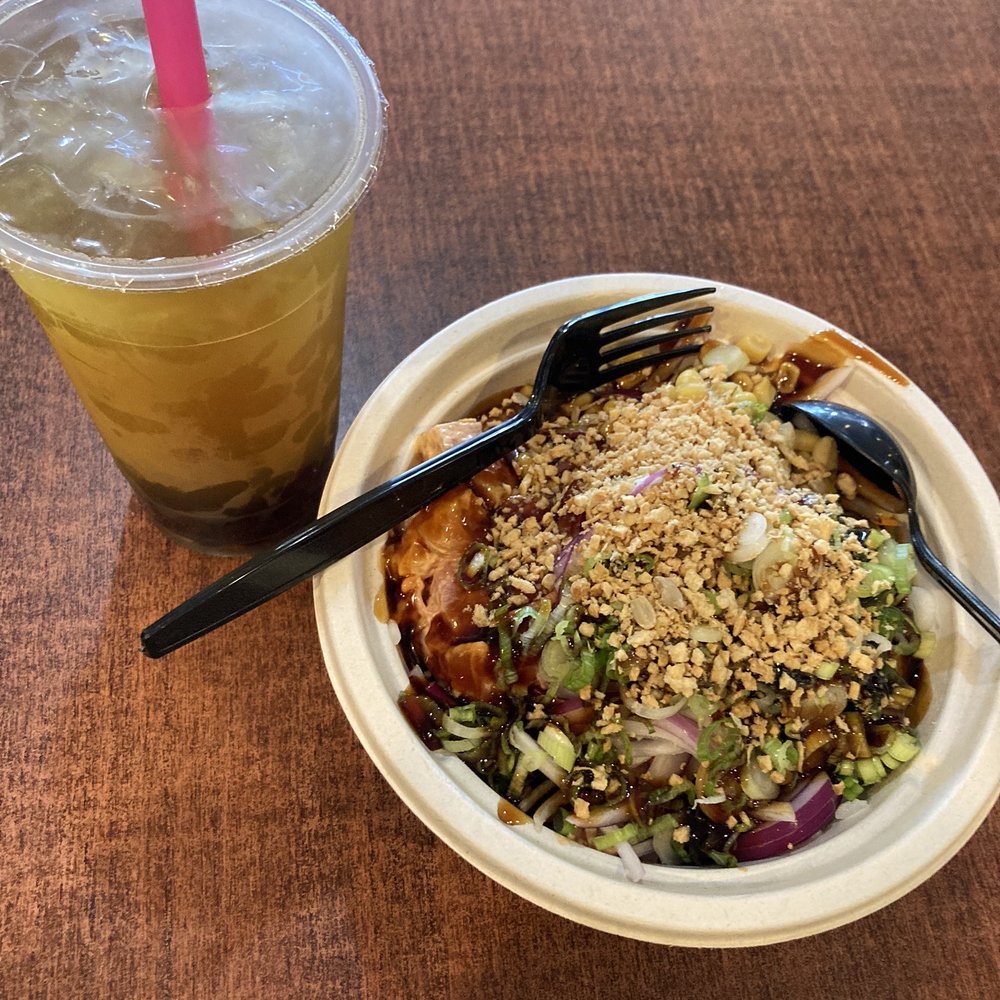 Green tea boba and large spicy tuna and spicy salmon poke bowl Green tea boba and large spicy tuna and spicy salmon poke bowl
