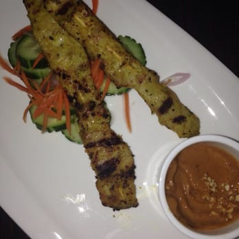 Palm Thai Bistro - Ma Chicken Satay... In a hurry to dig in... So pic was taken after we started eating! - Thai Near Me - Fairfield, California
