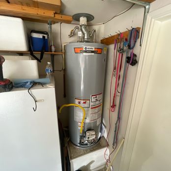 Mother Modern Plumbing - A gas water heater replacement in an attached garage with roof vent in Arlington, TX - Water Heater Installation/Repair Near Me - Fort Worth, Texas Mother Modern Plumbing - A gas water heater replacement in an attached garage with roof vent in Arlington, TX - Water Heater Installation/Repair Near Me - Fort Worth, Texas