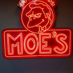 a neon sign for a restaurant a neon sign for a restaurant