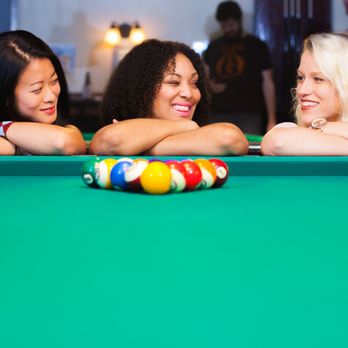 Clicks Billiards - three women playing pool - Pool Halls Near Me - Baton Rouge, Louisiana