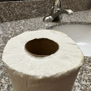 First Choice Inn - Closeup of the gross toilet paper someone put on the holder. Brown water stains on it. How does this happen-WHY??? - Hotels Near Me - Green River, Utah