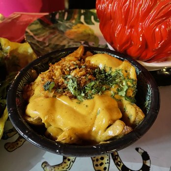 Rosi La Loca - Spicy potatoes with chipotle alioli and coriander - Tapas Bars Near Me - Madrid, M Rosi La Loca - Spicy potatoes with chipotle alioli and coriander - Tapas Bars Near Me - Madrid, M