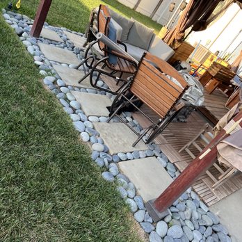 Herrera Lawn & Tree Maintenance - 3-4" Mexican Stone rocks around the perimeter of the deck. - Landscaping Near Me Herrera Lawn & Tree Maintenance - 3-4" Mexican Stone rocks around the perimeter of the deck. - Landscaping Near Me