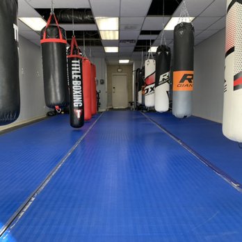 Mastering Martial Arts - Inside of the gym. Picture of martial arts mats, boxing and kickboxing bags. - Boxing Near Me - Aurora, Colorado Mastering Martial Arts - Inside of the gym. Picture of martial arts mats, boxing and kickboxing bags. - Boxing Near Me - Aurora, Colorado