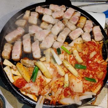 Chon Dak - Pork Belly (cut up for us) on a stove at the table 02-27-2025 - Bars Near Me - Gardena, California Chon Dak - Pork Belly (cut up for us) on a stove at the table 02-27-2025 - Bars Near Me - Gardena, California