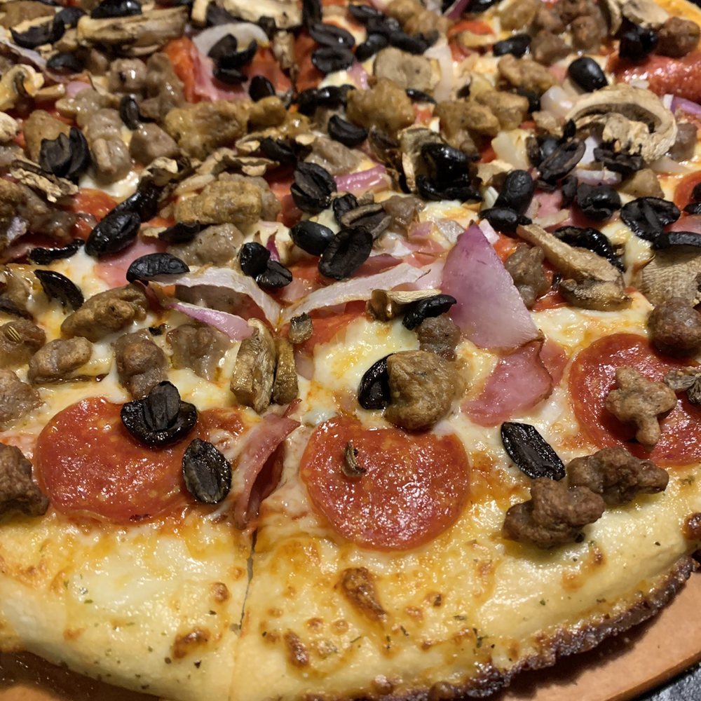 Pizza Hut - Pizza looked good and tasted good. Don't trust how clean the pizza platter was though - Pizza Near Me - Rexburg, Idaho