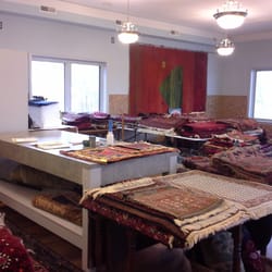 Blue Moon Antiques - A room full of rugs