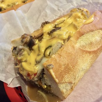 Tat's Delicatessen - Hot Peppers, Onions, and Cheez Whiz Philly Cheesesteak - Tat's Deli - Delis Near Me - Seattle, Washington Tat's Delicatessen - Hot Peppers, Onions, and Cheez Whiz Philly Cheesesteak - Tat's Deli - Delis Near Me - Seattle, Washington