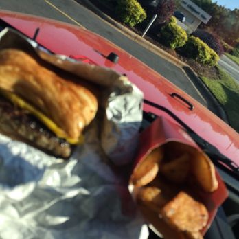 Wendy's - a sandwich and potato chips on a wrapper - Burgers Near Me - Forest City, North Carolina Wendy's - a sandwich and potato chips on a wrapper - Burgers Near Me - Forest City, North Carolina