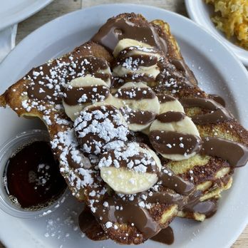 Fratelli Cafe - Brioche French Toast with banana and Nutella - Coffee & Tea Near Me - Los Angeles, California Fratelli Cafe - Brioche French Toast with banana and Nutella - Coffee & Tea Near Me - Los Angeles, California