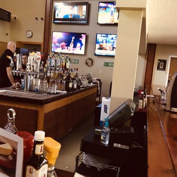 Mulligan's Bar and Grill - man at the bar - American Near Me - Wisconsin Dells, Wisconsin Mulligan's Bar and Grill - man at the bar - American Near Me - Wisconsin Dells, Wisconsin