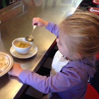 Rachawadee Thai Cafe - My 2 year old daughter enjoying the wonderful soup - Thai Near Me - Mount Vernon, Washington Rachawadee Thai Cafe - My 2 year old daughter enjoying the wonderful soup - Thai Near Me - Mount Vernon, Washington