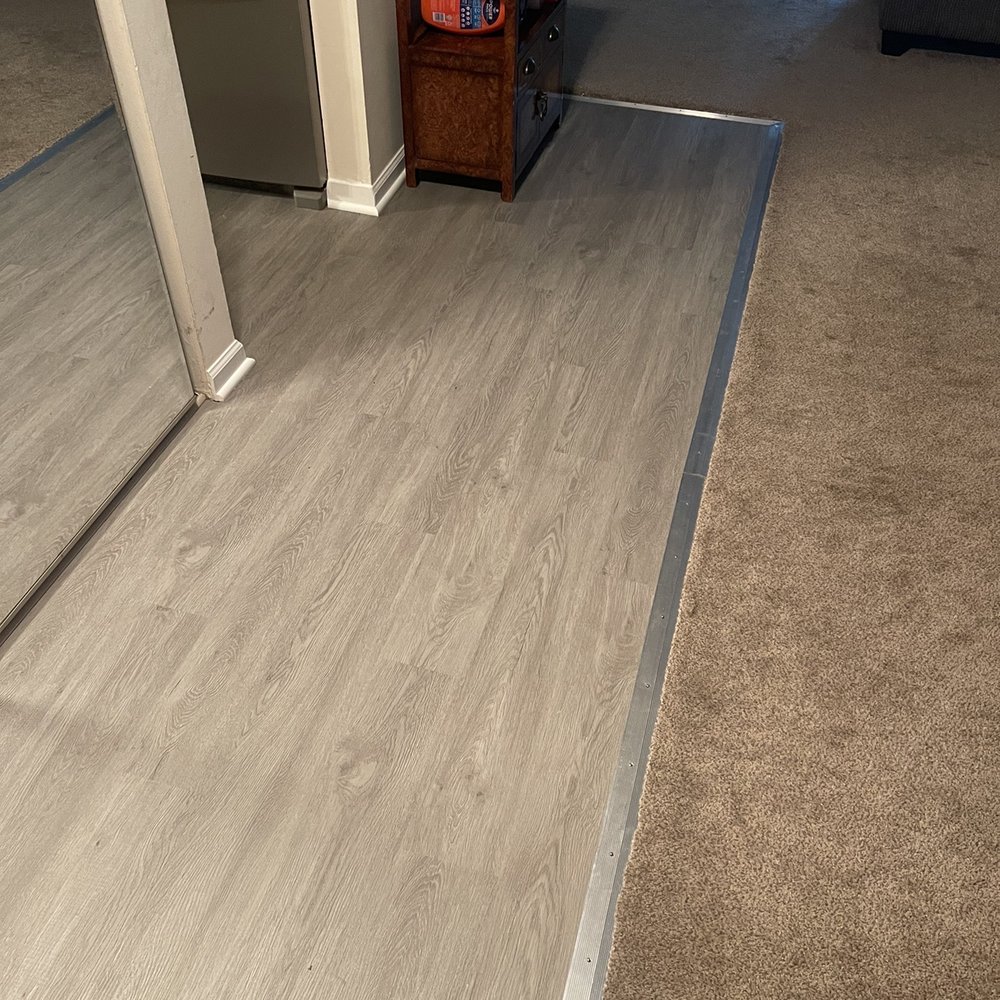 Perfect Edge - a view of a living room from the hallway - General Contractors Near Me - Wheeling, Illinois